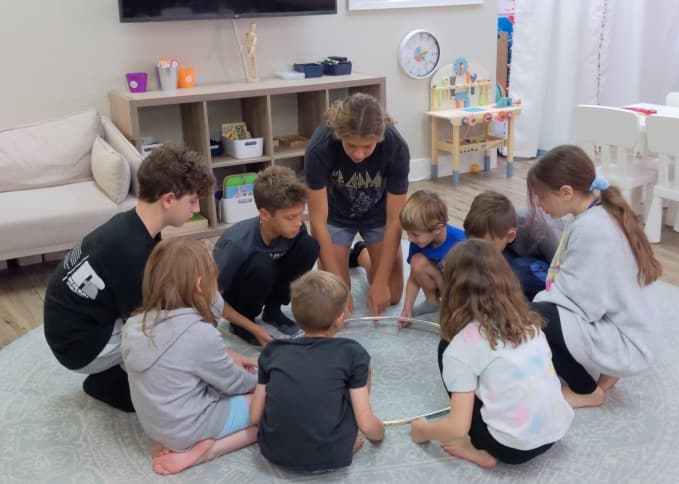 Acton learners in a Socratic discussion