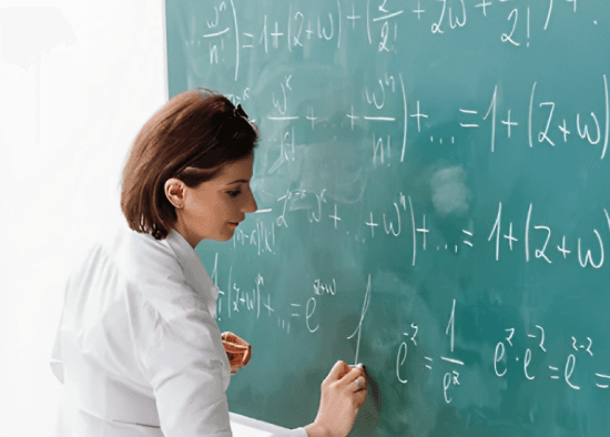 A teacher lecturing at a chalkboard