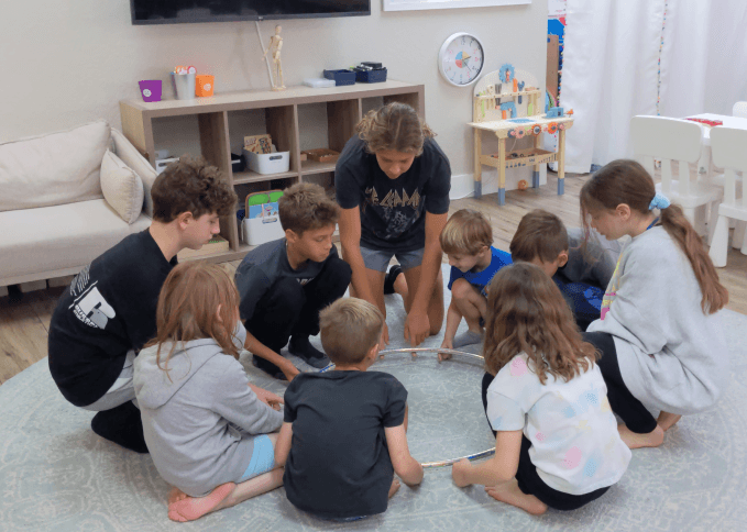 Acton learners in a Socratic discussion